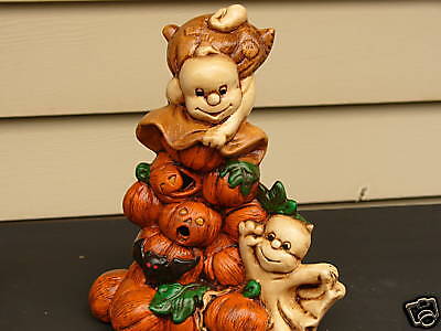 Finished Ceramic Stack of Pumpkins and Ghost  